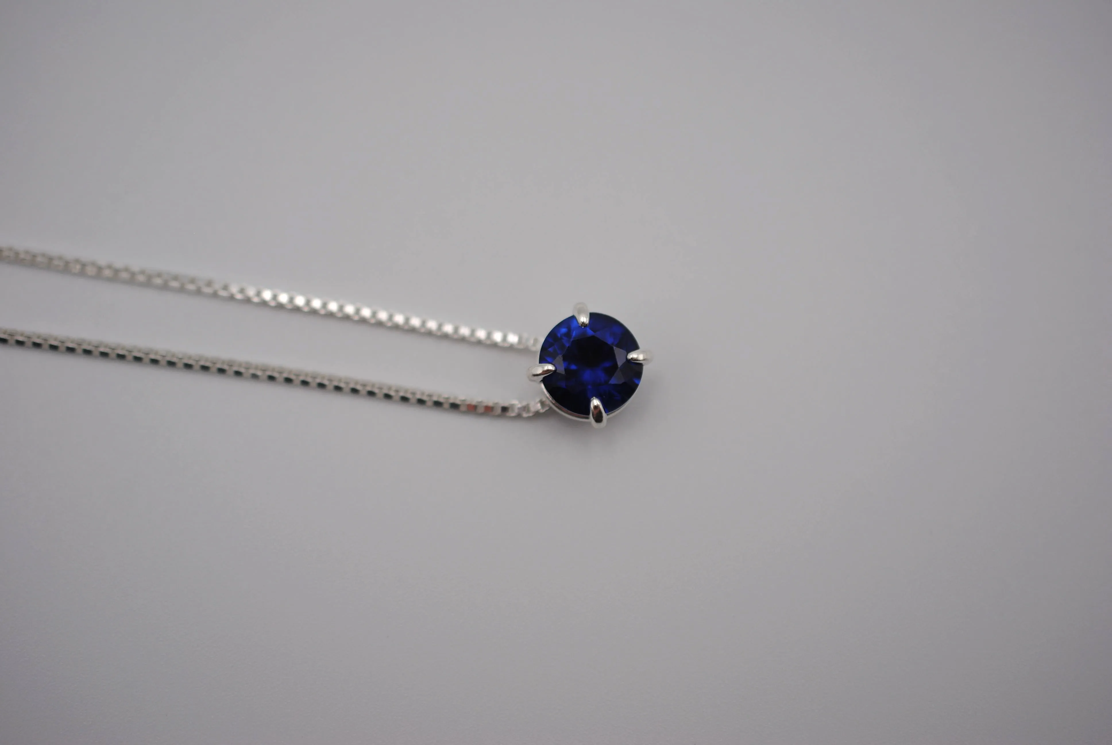 Birthstone Necklace: Round Sapphire, Silver Prong Setting, Adjustable Box Chain