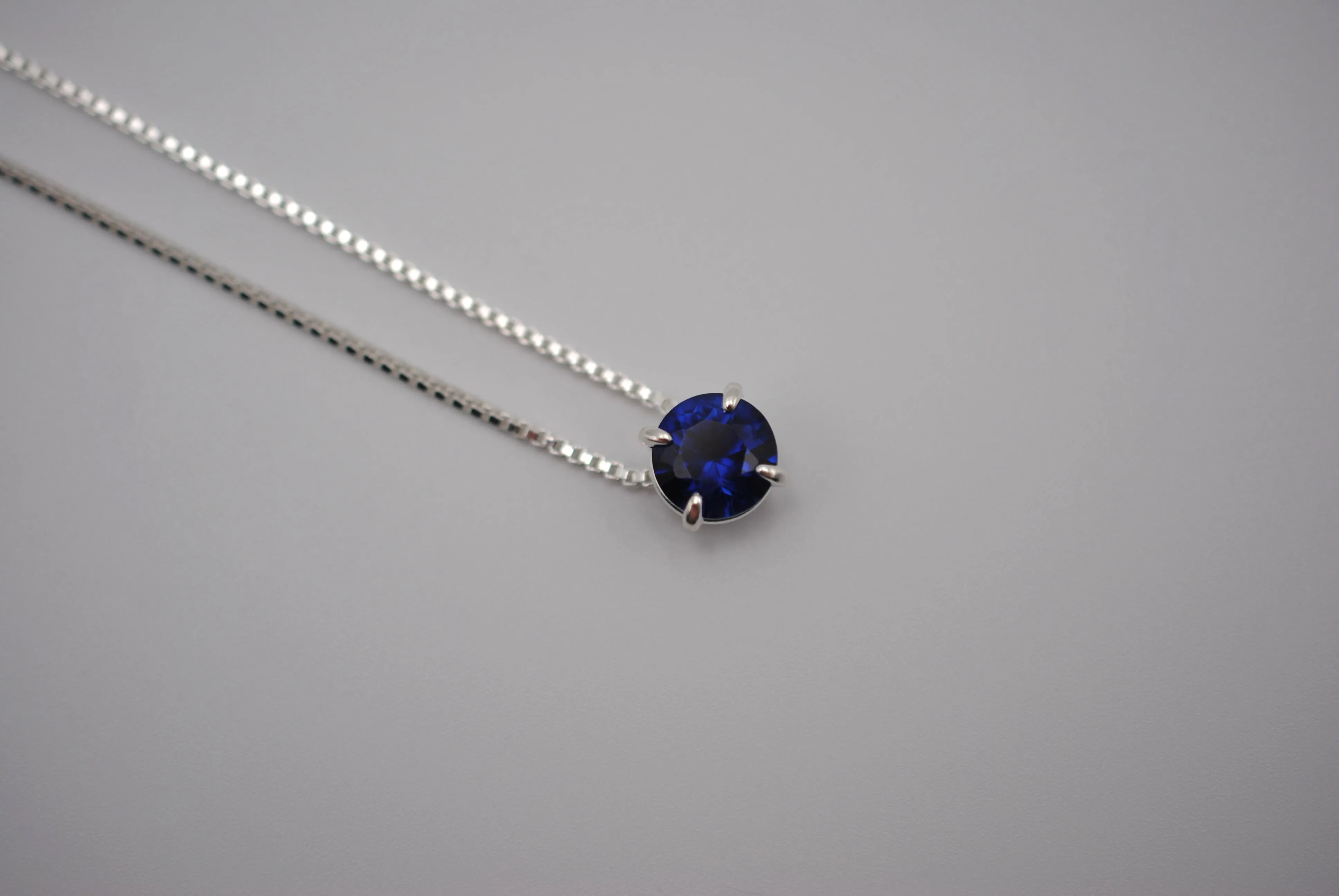 Birthstone Necklace: Round Sapphire, Silver Prong Setting, Adjustable Box Chain