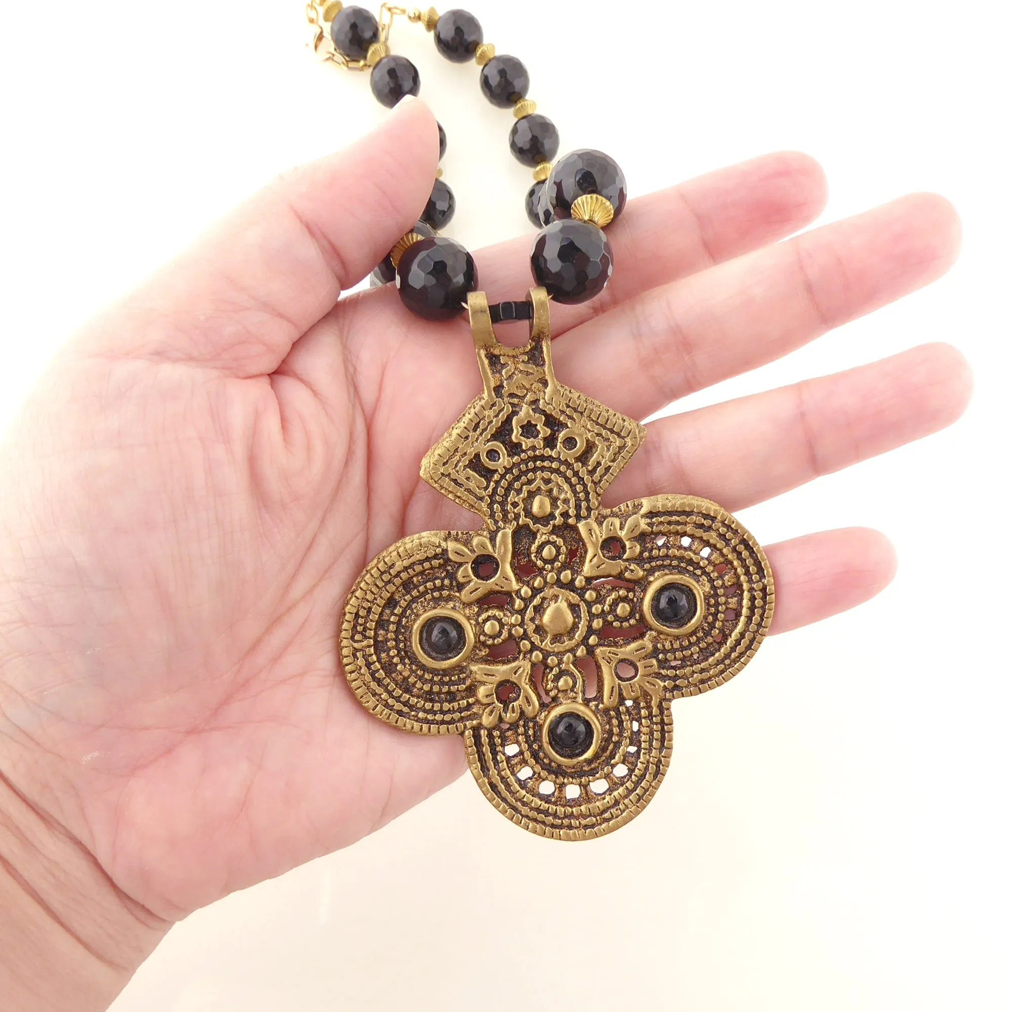 Black onyx and brass cross necklace