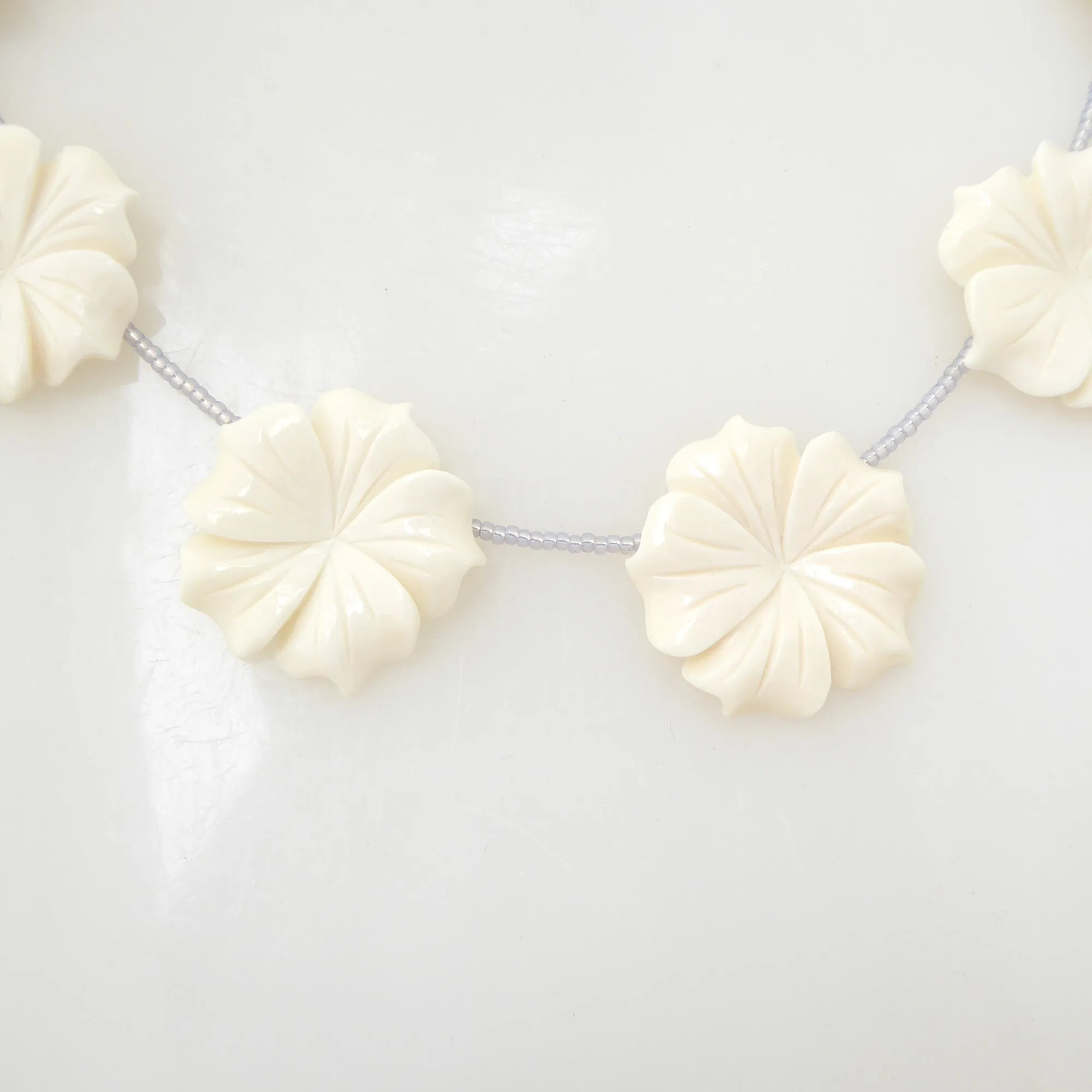 Carved flower beaded necklace