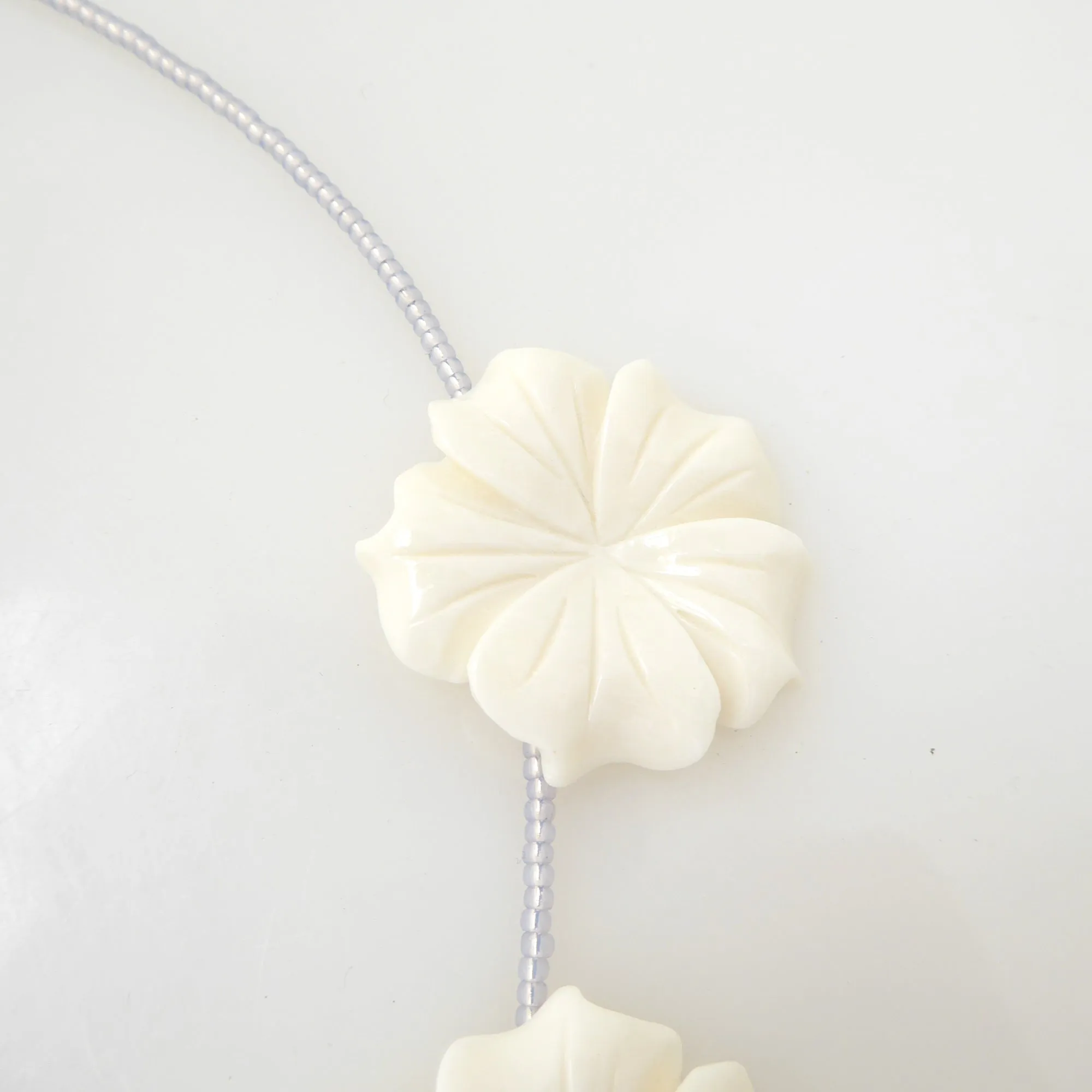 Carved flower beaded necklace
