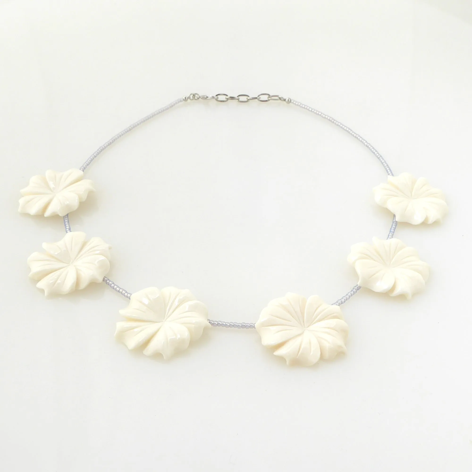 Carved flower beaded necklace