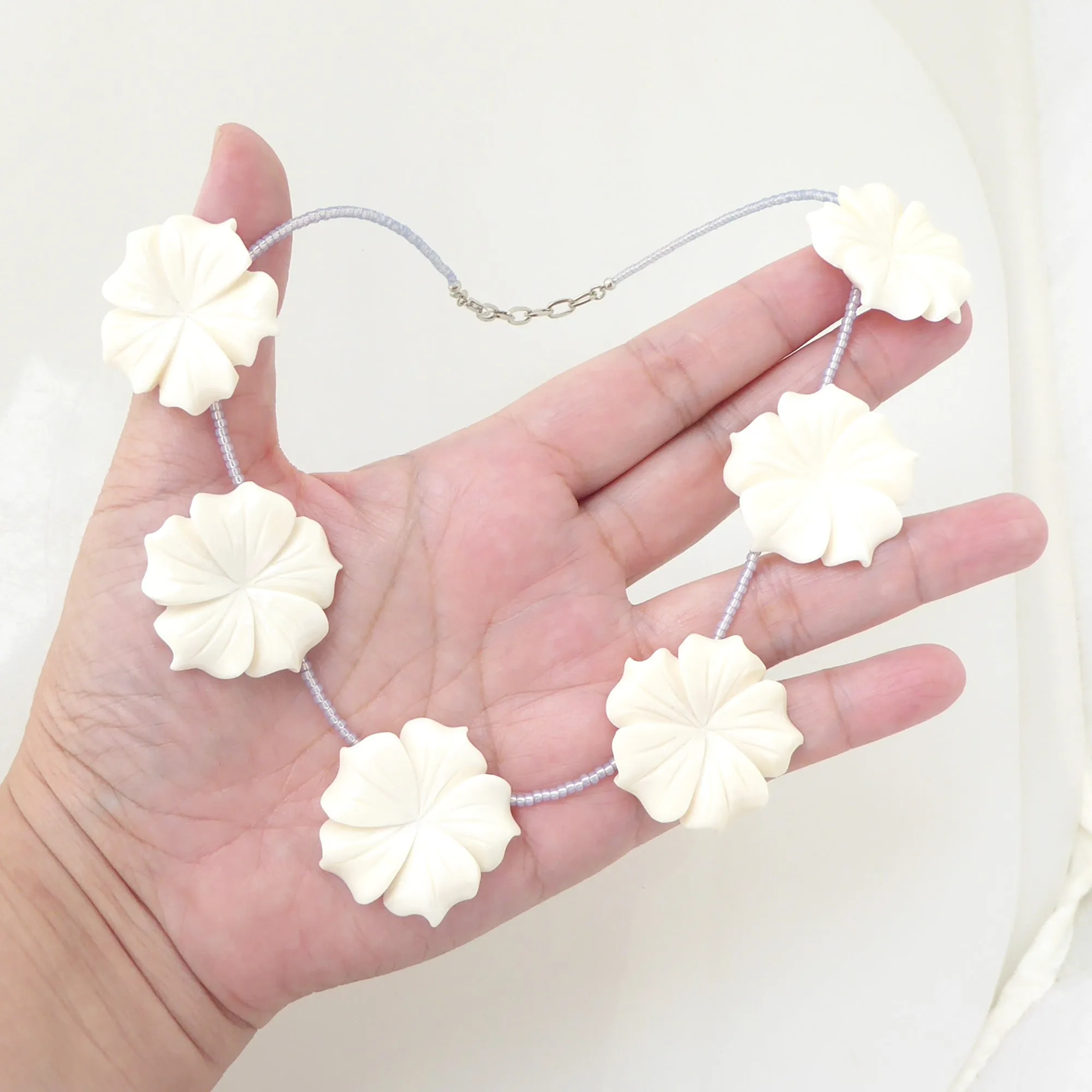 Carved flower beaded necklace