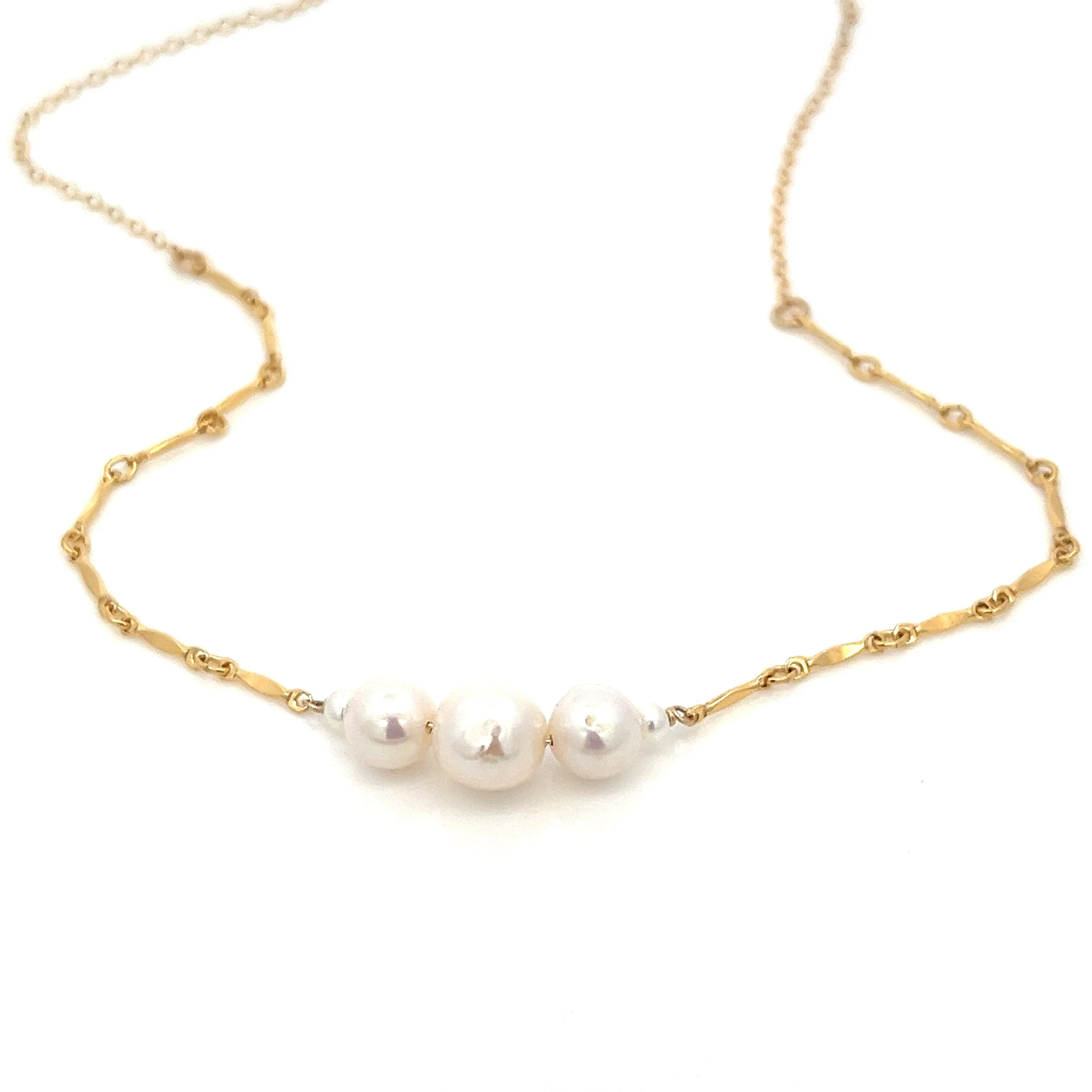 graduated five-pearl and gold bar necklace