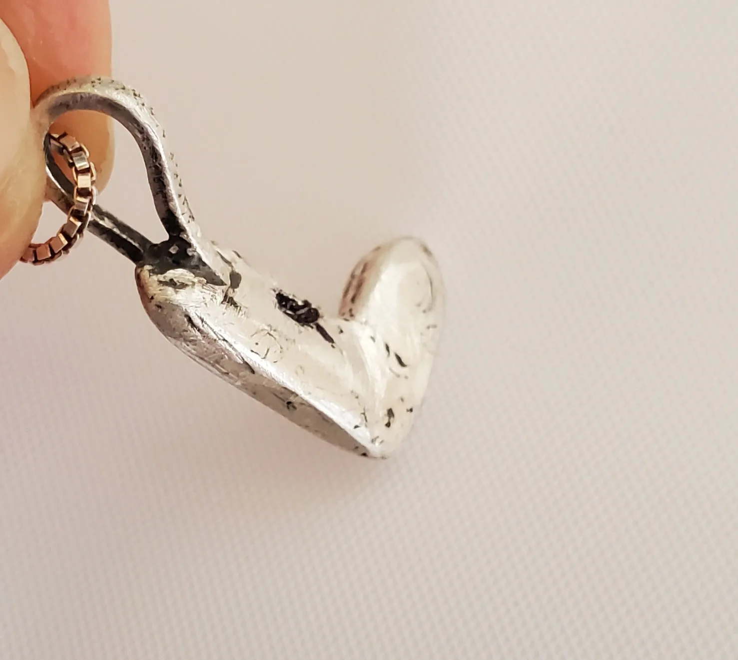 Simon & LuLu hand carved heart pendant