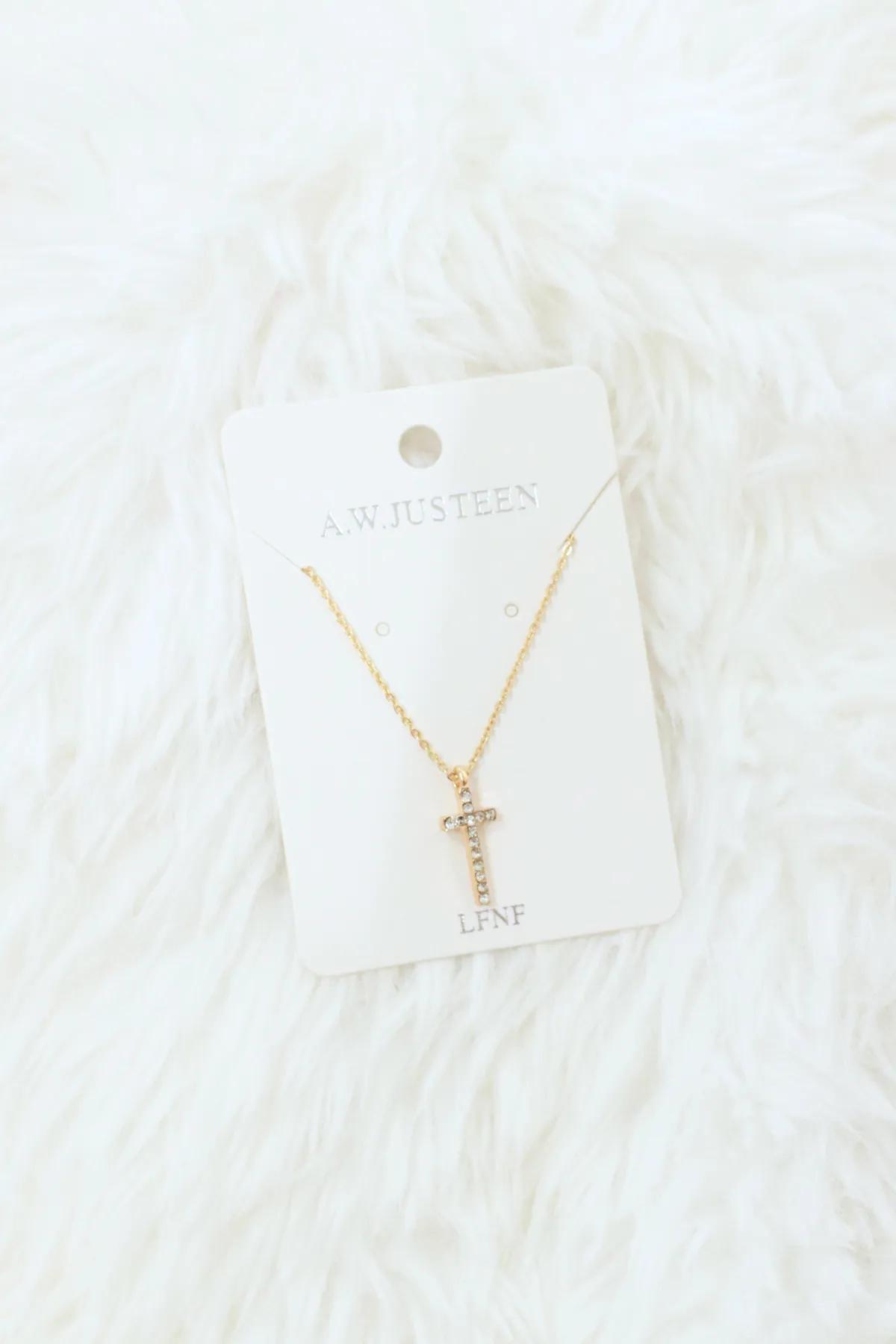 SMALL GOLD CROSS NECKLACE