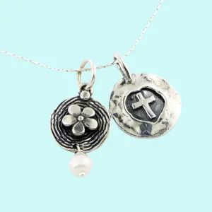 Sterling Silver Necklace for woman set with a cross and a flower charm